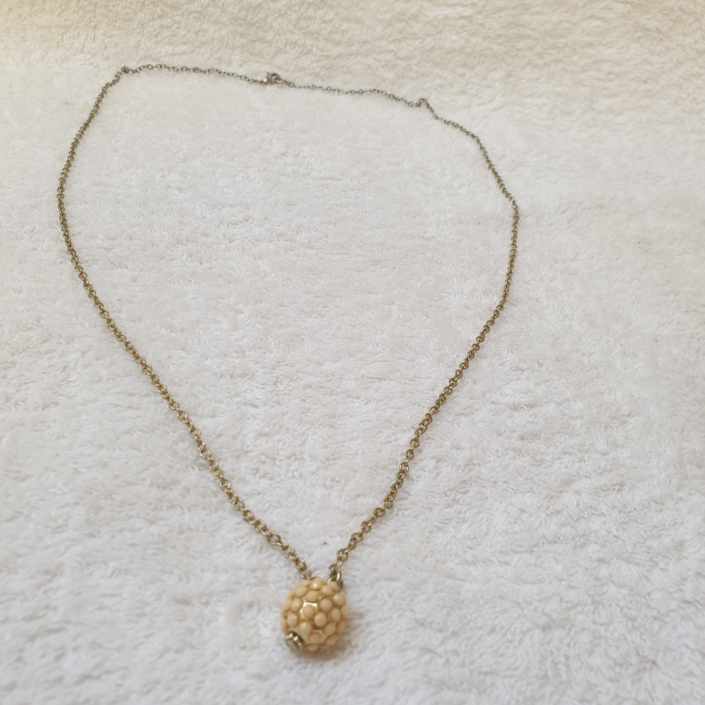 Only necklace accented ball